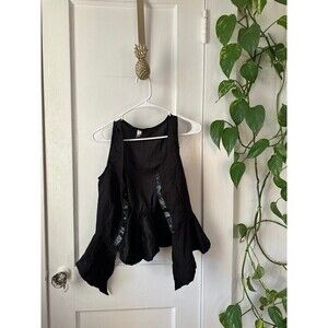 Women’s size small party city brand black vest